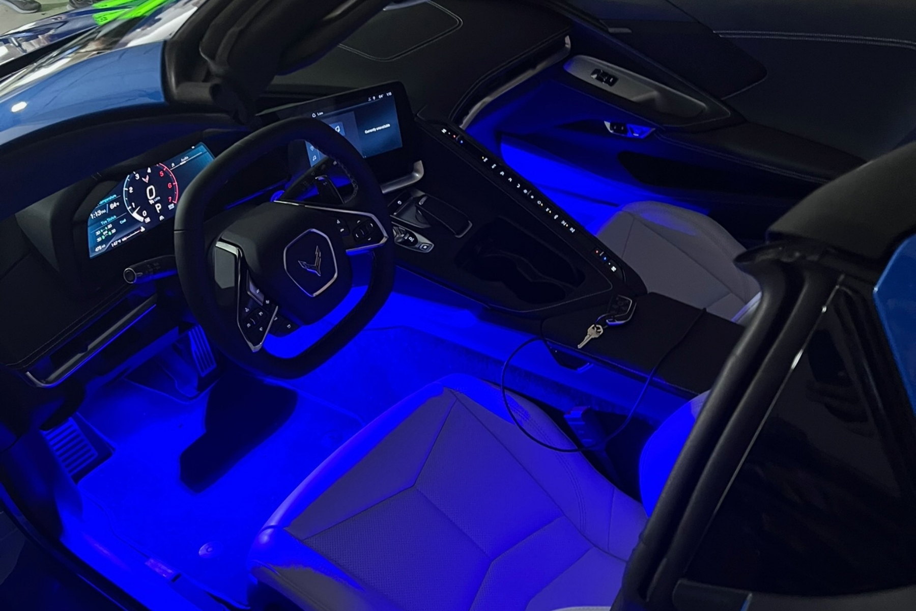 Interior footwell and dash accent lighting in a customer vehicle — installed by Sturgess Customs
