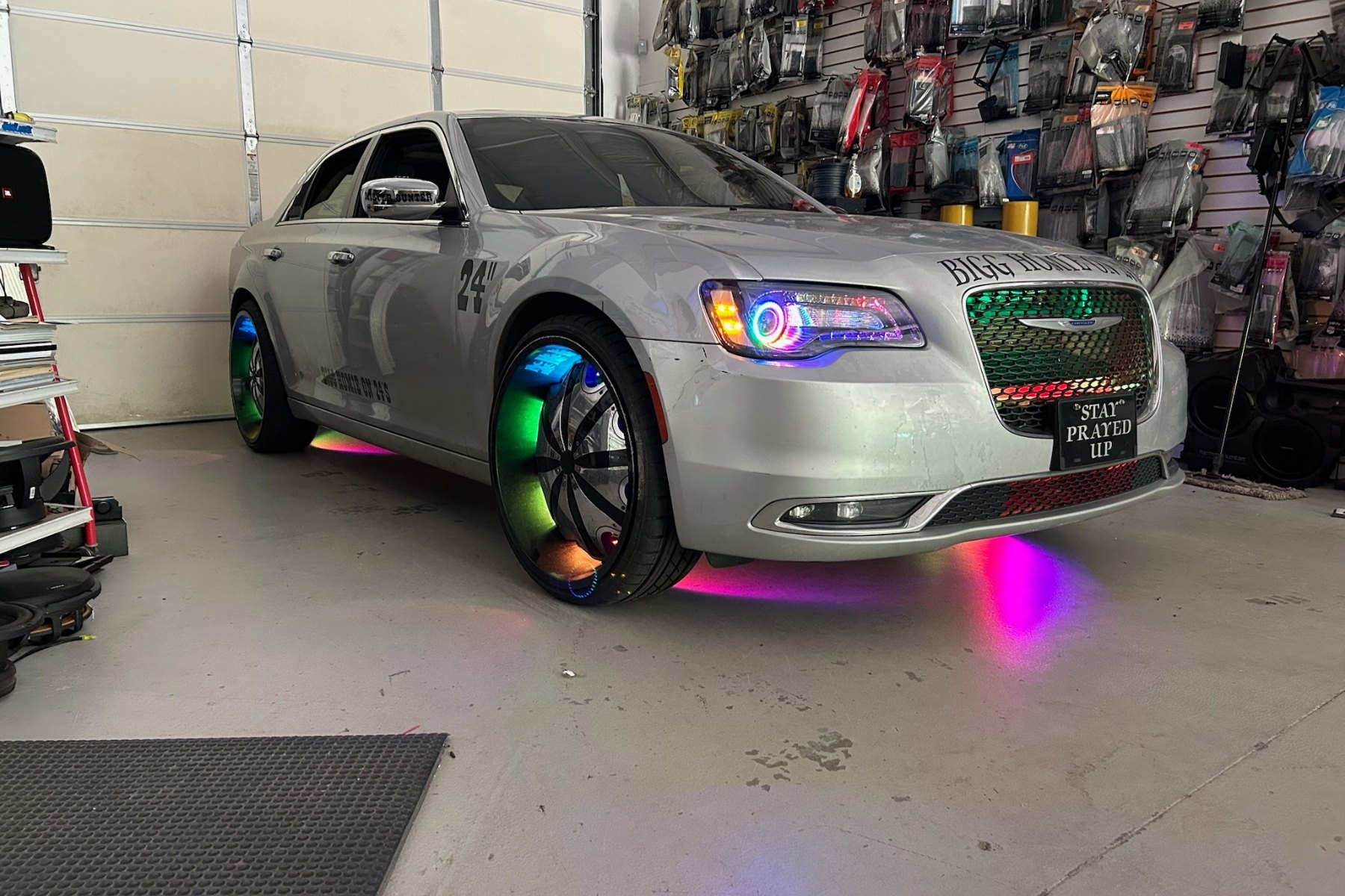 Rocker/grille/badge accent on real vehicle, daylight or twilight — installed by Sturgess Customs