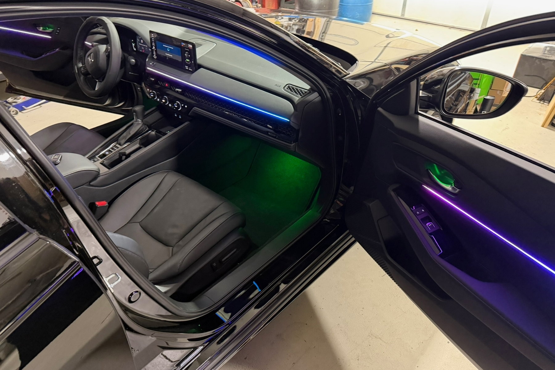 Footwell/dash/dome install in real cabin, daylight or dawn/dusk — installed by Sturgess Customs