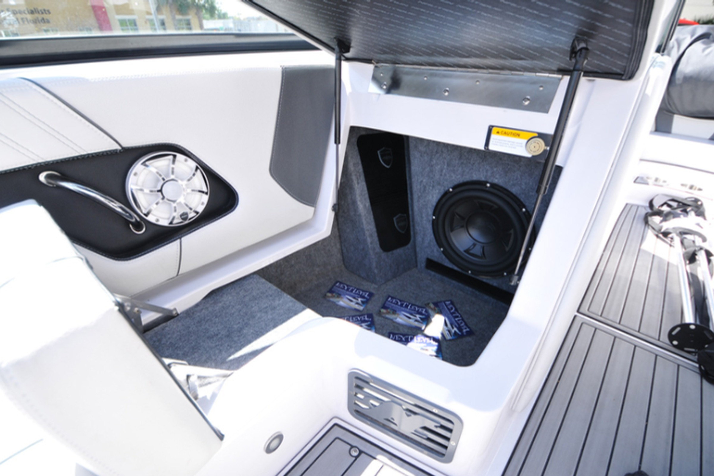 Cockpit helm-pod integration or cabin-zone install detail — installed by Sturgess Customs