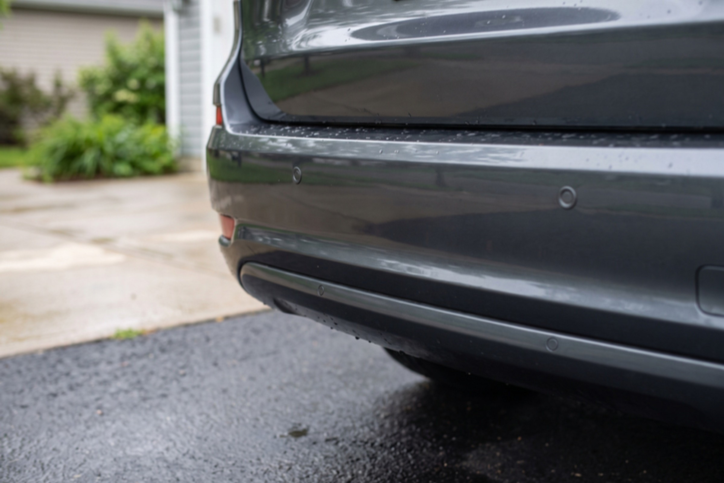Sensors flush with bumper, factory-style integration, daytime — installed by Sturgess Customs