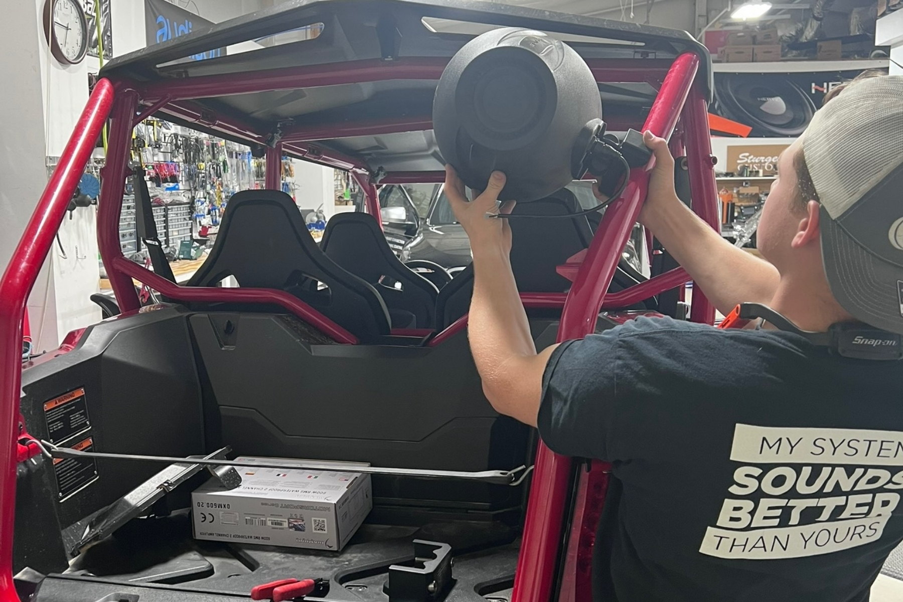 Pod/soundbar install detail, diagnostic quality — installed by Sturgess Customs
