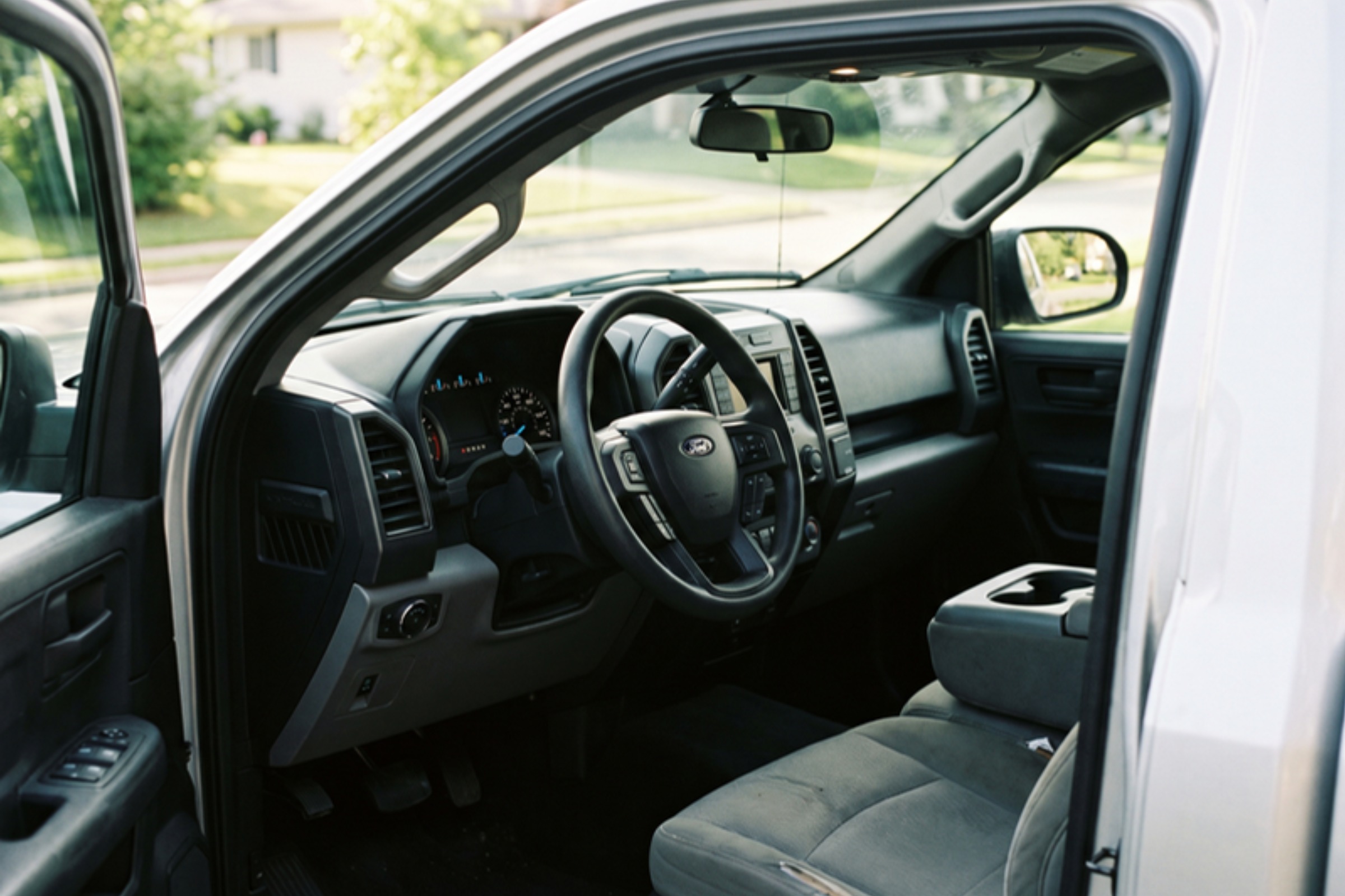 Factory-correct dashboard/steering column, integration invisible — installed by Sturgess Customs