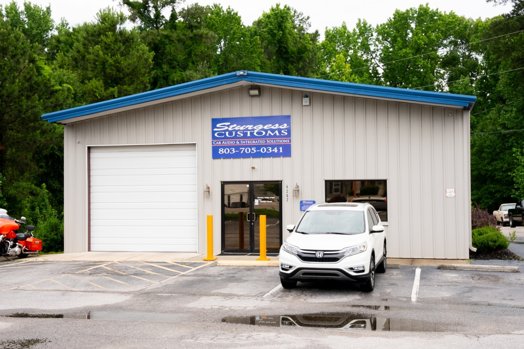 Storefront / community-context photo — installed by Sturgess Customs